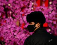 2017年1月3日，北京，一名戴著口罩的安保人員。攝影：Thomas Peter