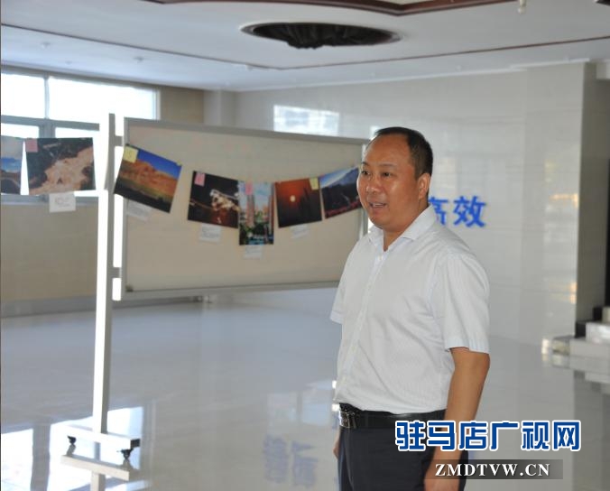 中原銀行駐馬店分行舉辦“幸?！ぶ性恕睌z影書畫展受好評(píng)