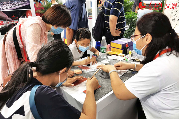 非遺、文創(chuàng)“吸睛”，傳統(tǒng)文化扮靚服貿(mào)會