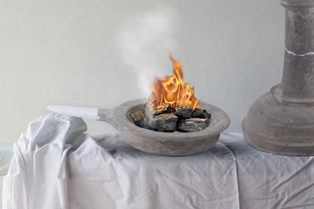 文博日歷丨古人的熨斗上有個會打招呼的瑞獸